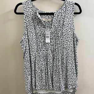 Loft flowing, dressy shell.